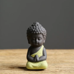 Buddha tea pet i keramik med förenade händer — Ljus citrongul