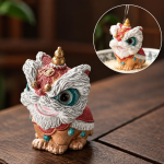 Dansande lejon tea pet i resin — Mörkröd