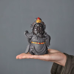 Gongfu-tefigur med färgskiftande ansikte