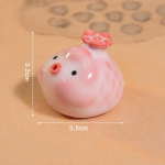 Grisformad tea pet i keramik