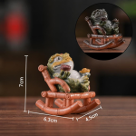 Gyllene padda tea pet i resin — Rostbrun