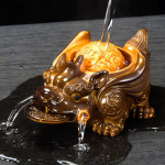 Kinesisk tea pet i konstharts med färgskiftning