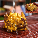 Kinesisk tea pet i konstharts med färgskiftning