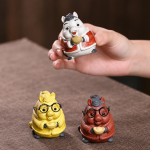 Lyckogris tea pet i Yixinglera