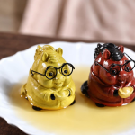 Lyckogris tea pet i Yixinglera