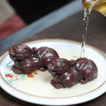 Pixiu tea pet med reliefsnirklar