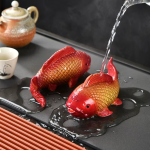 Tea pet-fiskar i resin med färgskiftande effekt