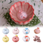 Tea pet i keramik föreställande en gris