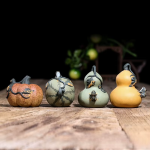 Tea pet i lila lera med vattenstråle — 4-pack
