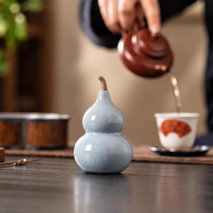 Tea pet kalebass i celadonkeramik