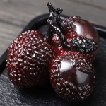 Tea pet med färgskiftande litchi i resin