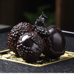 Tea pet med färgskiftande litchi i resin
