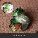 Tea pet med kinakål och gris i resin