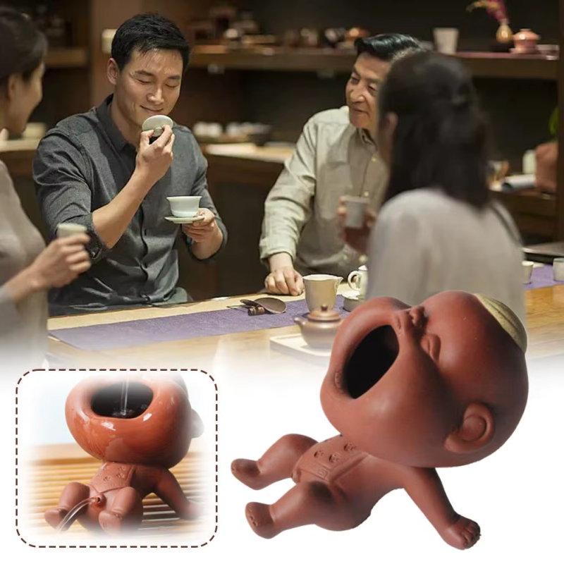 Tea pet med räv och babyfigur