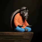 Tea pet med sköldpadda och gammal man i keramik — Orange