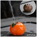 Tea pet som byter färg i resin — Orange med grönt blad