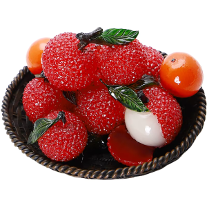 Tefigur i harts med litchi för tebrickan