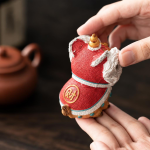 Temperaturkänslig tea pet med dansande lejon i harts